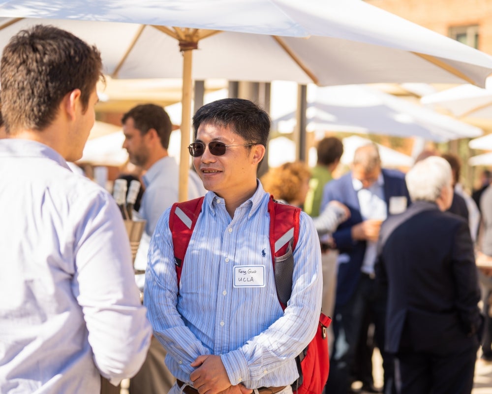 Two attendees chatting